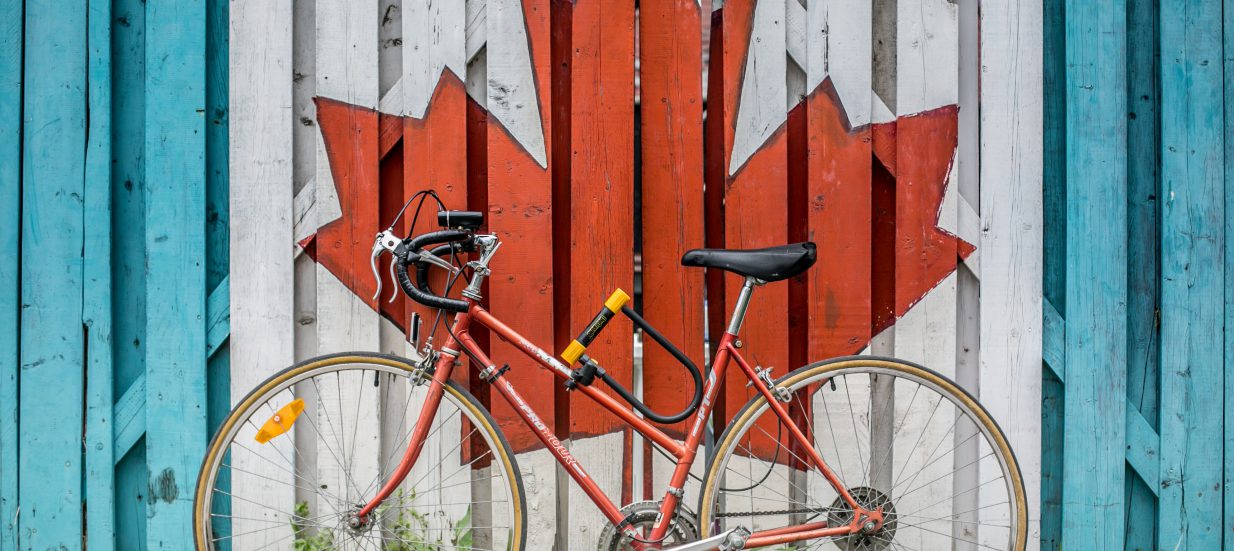 Bike in front of Canadian flag