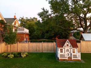 Big yards are great for kids in this Bay of Quinte backyard.