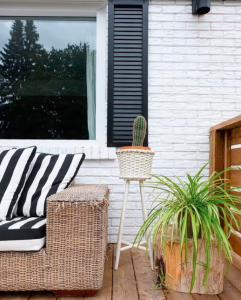 Indoor plants on a deck to add colour to an outdoor living space.