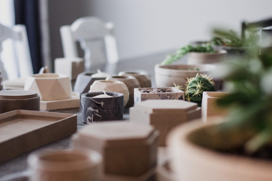 A variety of concrete items on a table.