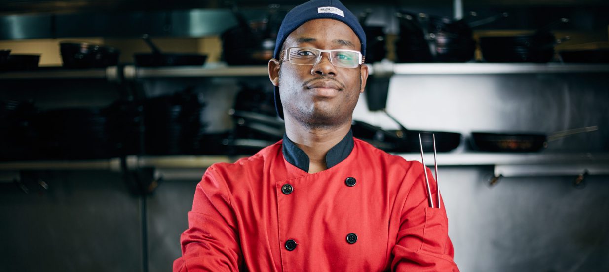 A chef standing with arms crossed. Ralph-Saint Dic of Creative Culinary Delights in Belleville.