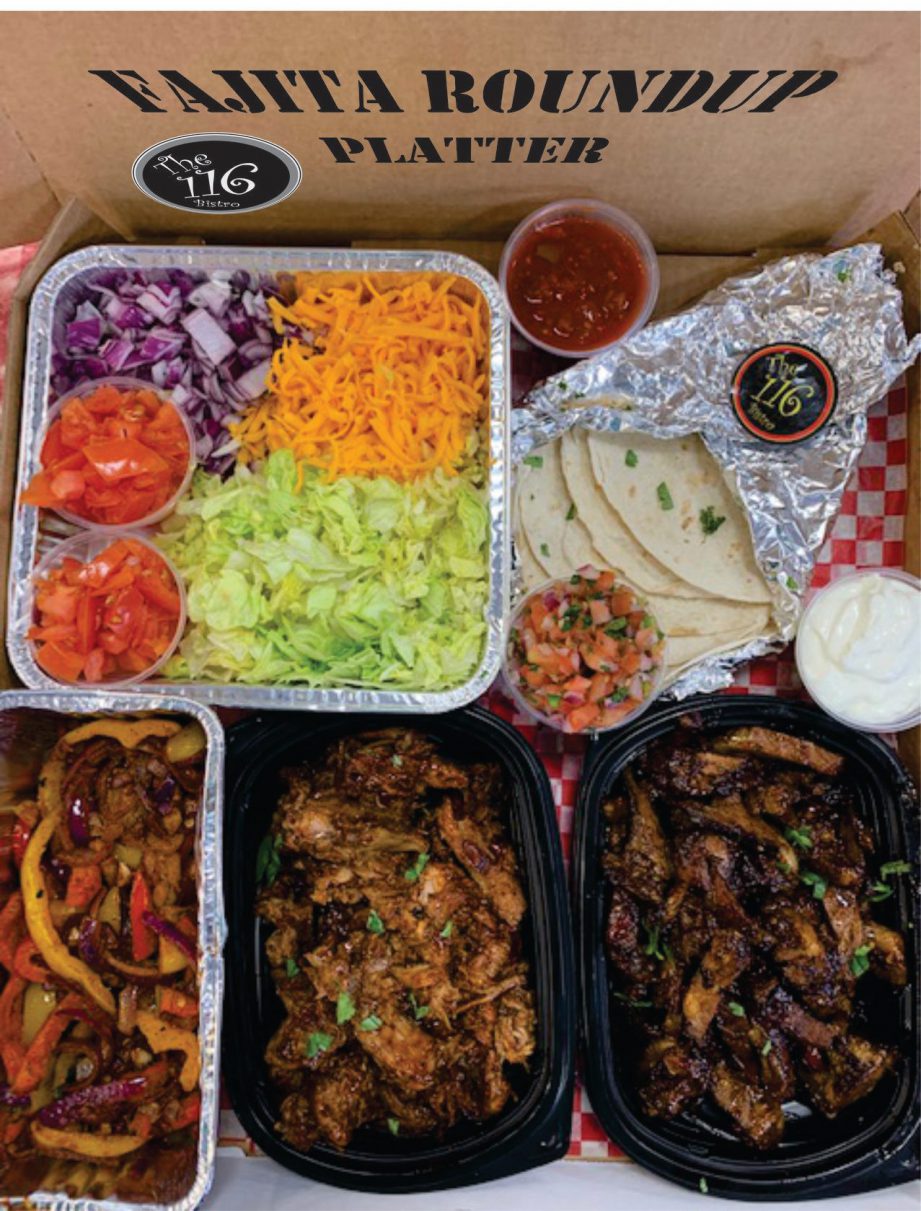 A takeout box with fajita fillings, vegetables, tortillas and salsa.