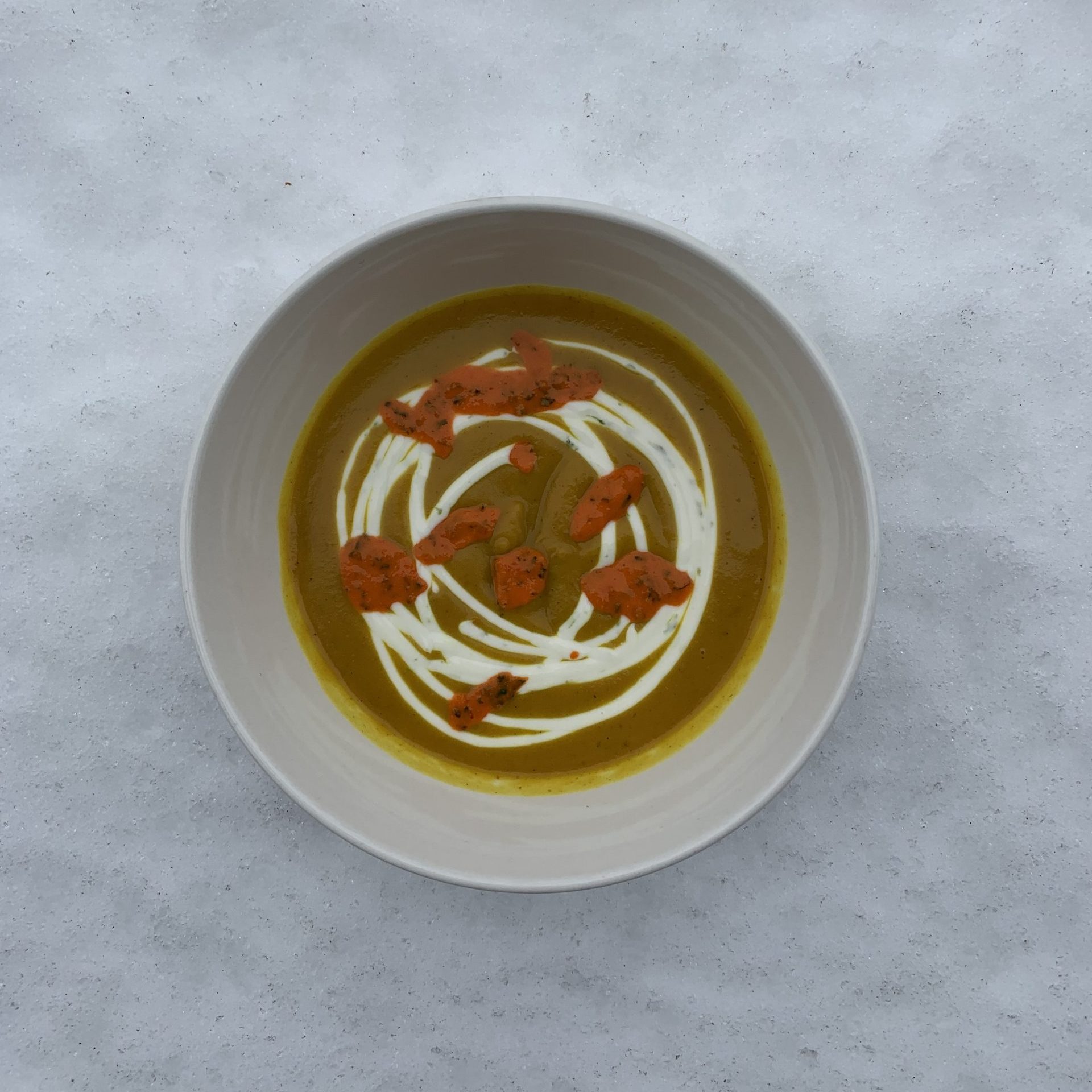 A bowl of curried coconut soup from The Counter restaurant